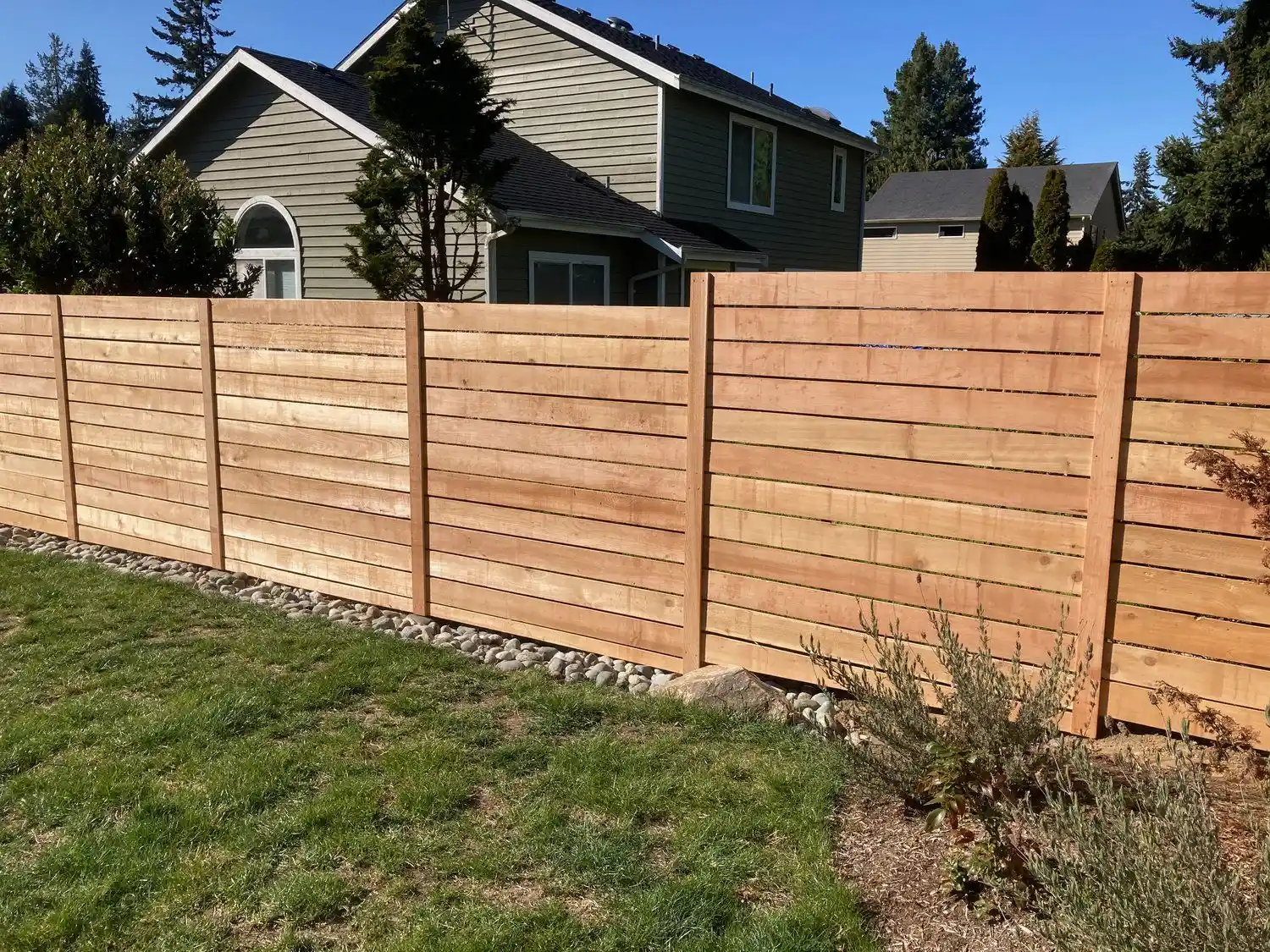 Horizontal fence shared with neighbors